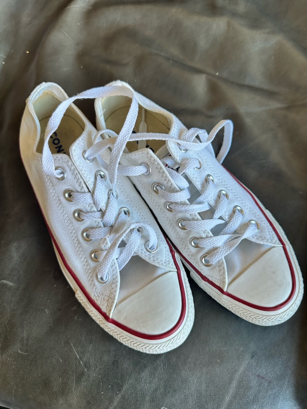 Converse Low Top Sneakers in White with Red Trim